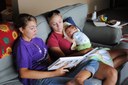 Nikki and Beth reading to Eddie